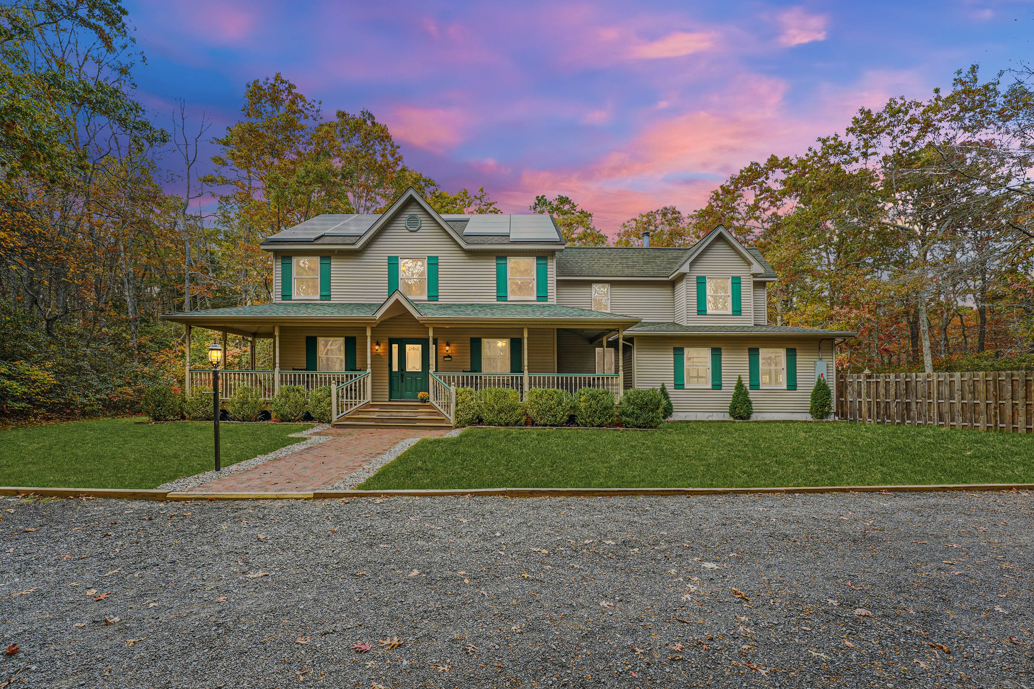 Stately Colonial Nestled on 6.5 Acres of Wooded Seclusion