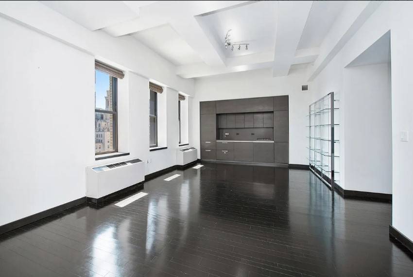 Corner 2BR with extra high ceilings at 20 Pine.