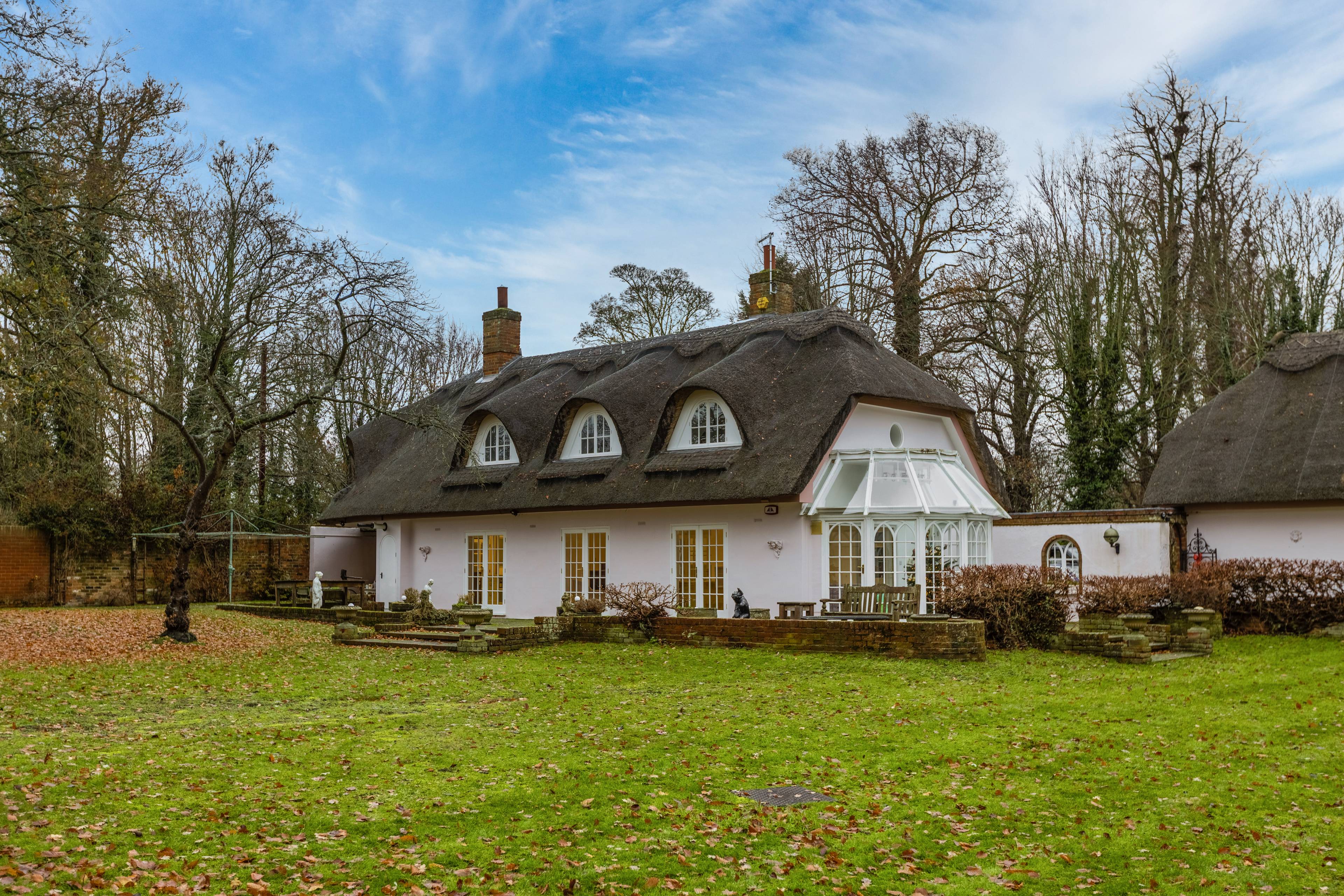 Contemporary Countryside Home with a Beautiful Thatched Roof Set In Grounds Of 7 Acres