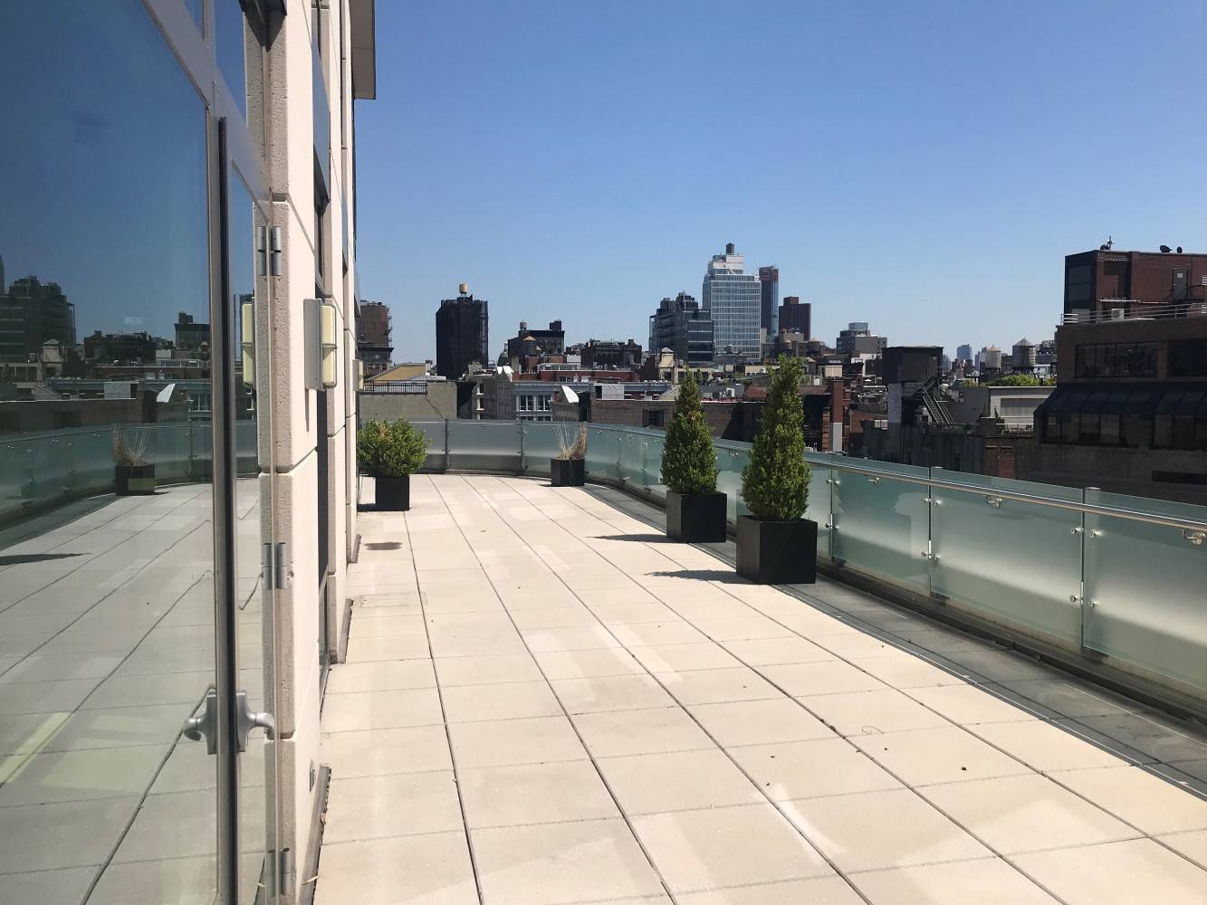 No Fee, Stunning 2 Bed / 2 Bath in Prime Soho Concierge Building with HUGE wraparound balcony, W/D in unit