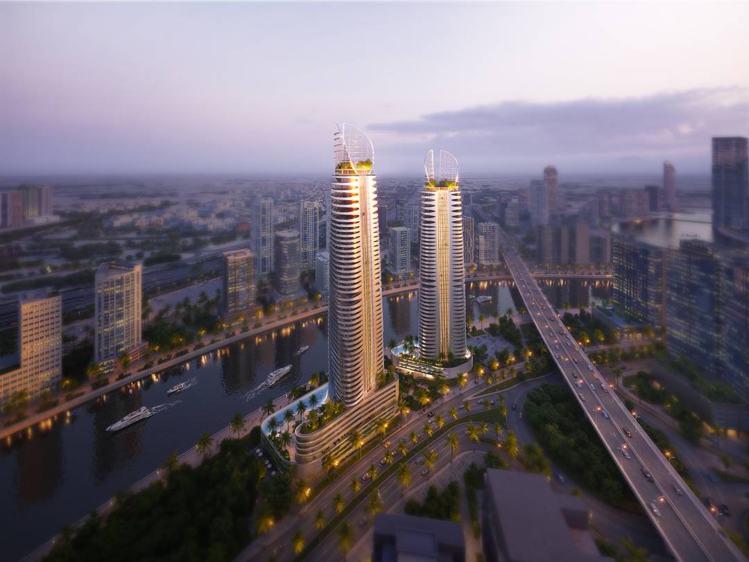 EXCEPTIONAL VALUE: DE GRISOGONO-DESIGNED 2-BEDROOM HAVEN WITH CANAL VIEWS, HUGE BALCONY, AND PRIVATE LAUNDRY