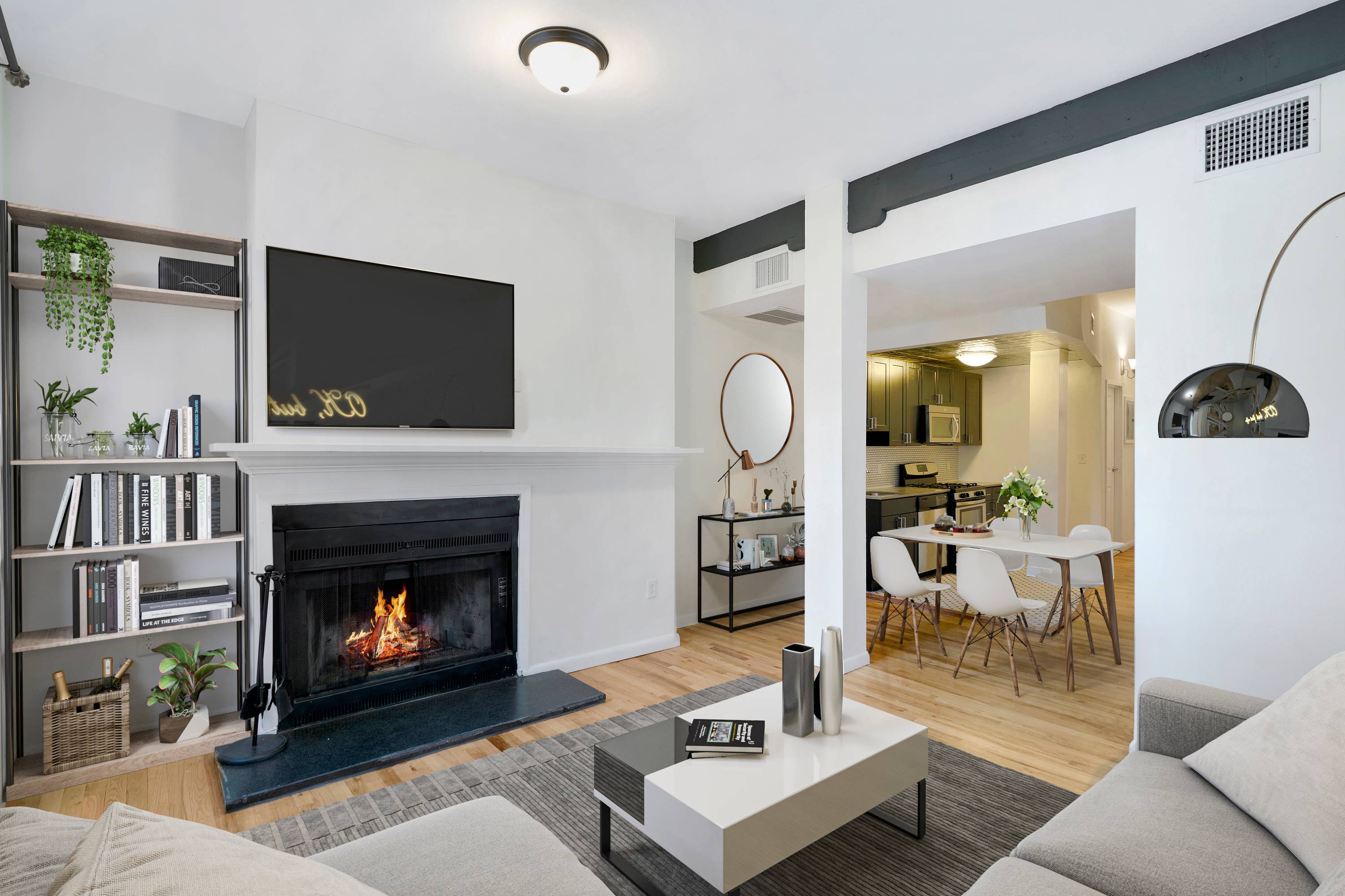 Beautiful Open and Spacious 2 Bedroom 1.5 Bathroom with Roofdeck and Wood Burning Fireplace located at the Grand Adams in Downtown Hoboken!