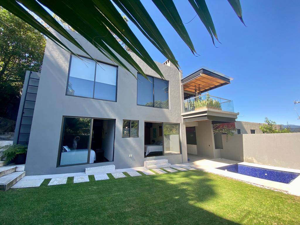 Charming cottage with a lake view.