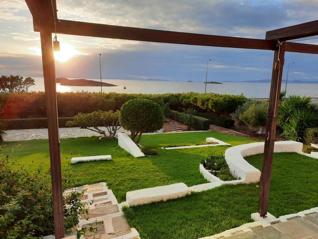 Villa Saronida 390 sqm with stunning Sea and Sunset views, with separate garden apt. and olive trees