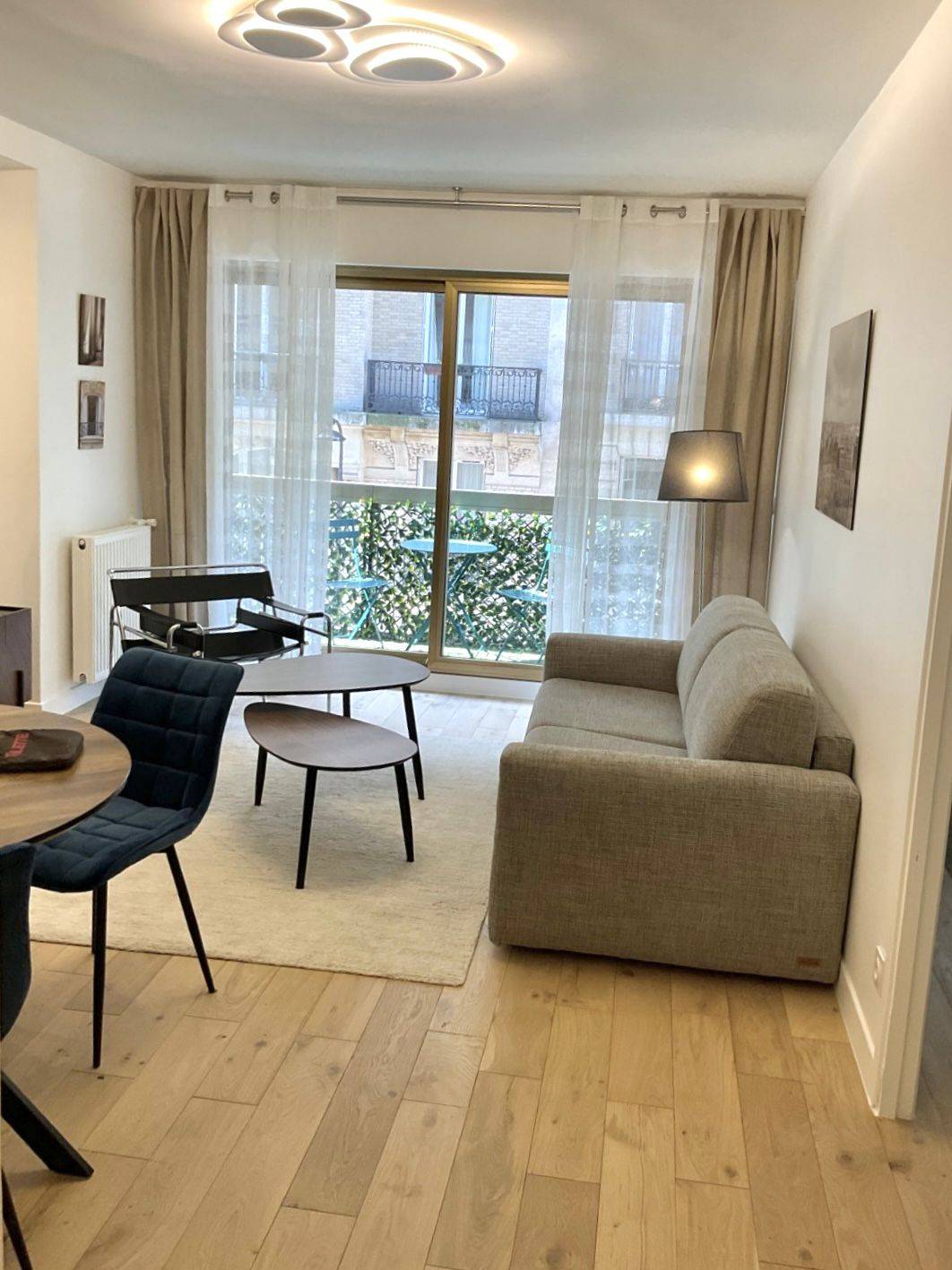 Two-Bedroom Apartment with Balcony, Garage, and Cave in the 16th Arrondissement