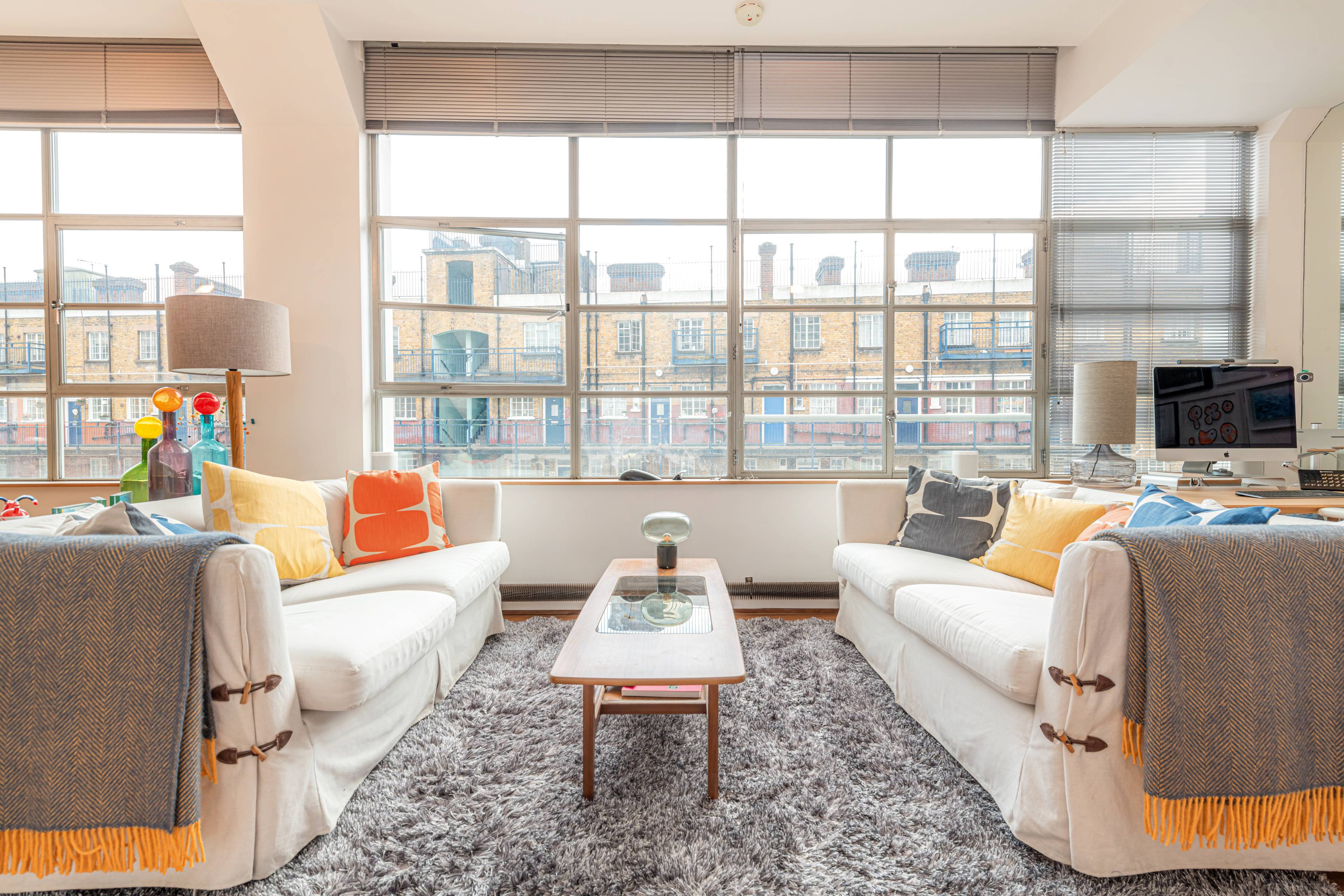 A stunning large one double - bedroom apartment with 3m high ceilings, parking, 24hour porter, gated development and next to Regents Canal