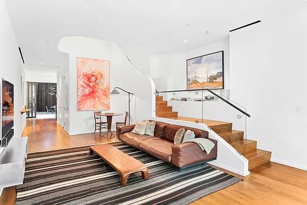 17’ wide 2,881 SqFt triplex townhouse with 3 bedrooms, 4 bathrooms, and a private gated entrance.