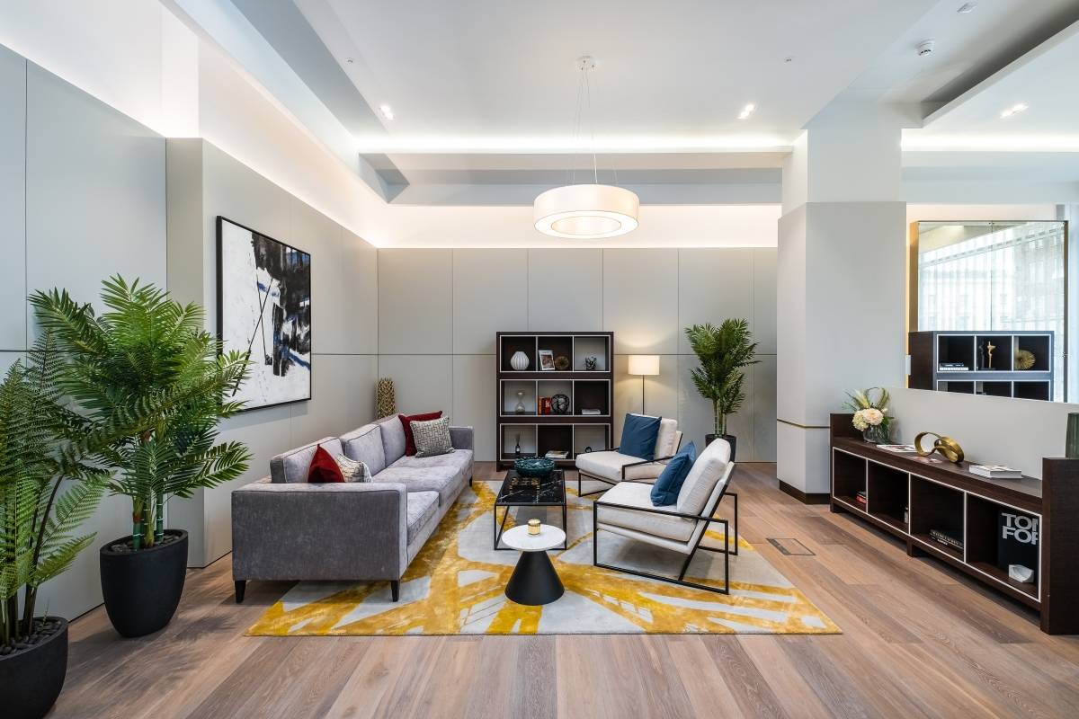 A modern two-bedroom apartment set on the second floor of the luxury Garret Mansions development.