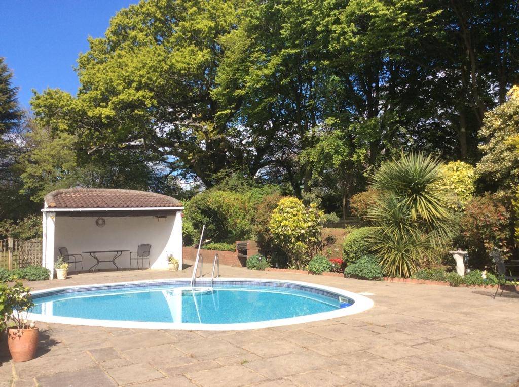 A spacious Family Bungalow with beautiful grounds in the picturesque village of Penn.