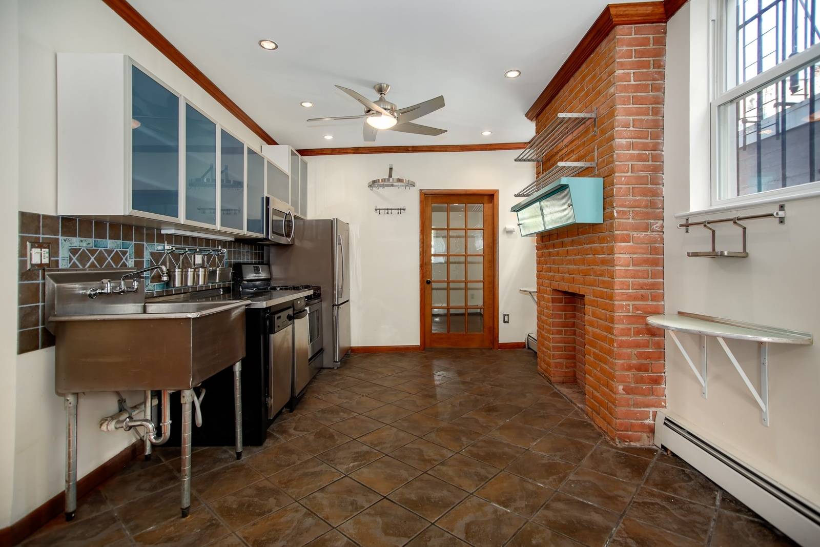 Stunning Chic 2 Bedroom 1 Bath Apartment located in Prime Downtown Jersey City! Parking and Laundry Included! Private Outdoor Backyard!