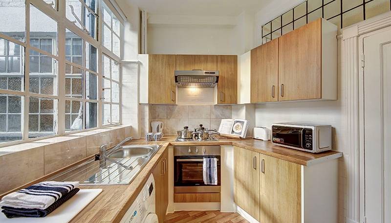 This superb ground floor two bedroom apartment with a large private garden is set within a ported building opposite the stunning Regents Park in St John's Wood.