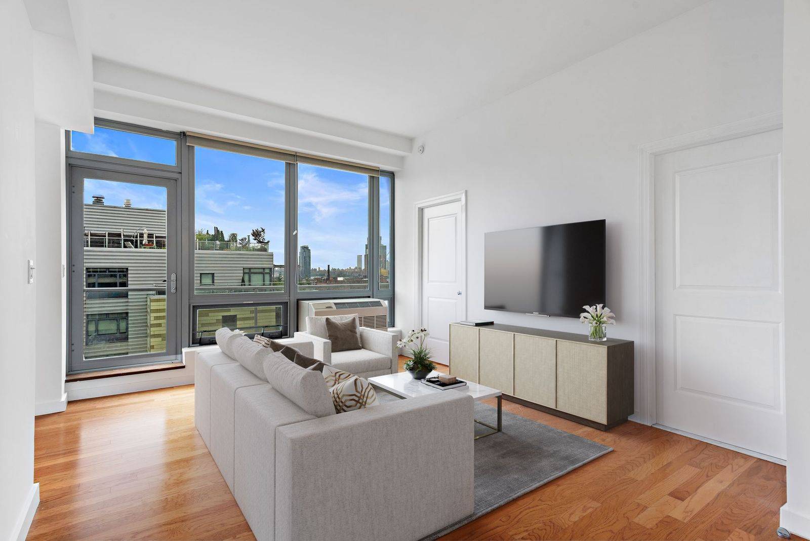 East River views with Manhattan Skyline  and 120 SF private balcony in long Island city