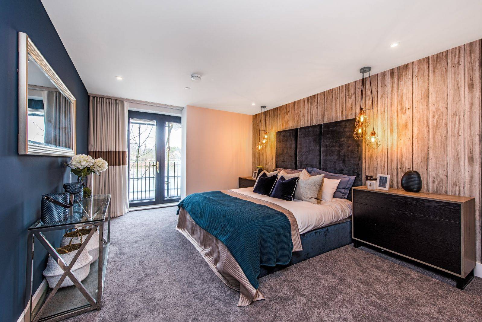 A spacious  riverside apartment with private balcony and immaculate views of the River Thames.