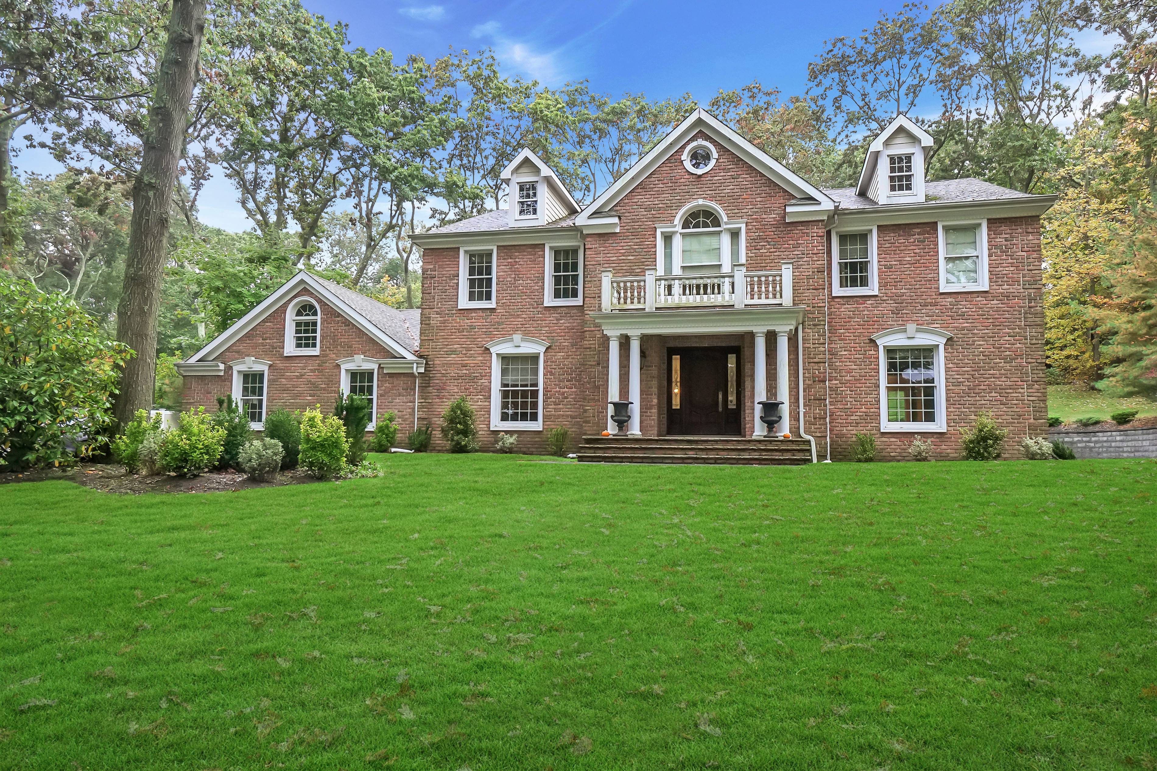 Elegant Brick Center Hall Colonial