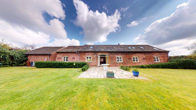 A CHARACTERFUL PIECE OF DRAMATIC BARN CONVERSION LIVING IN CRANAGE, CHESHIRE