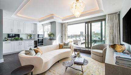 A stunning two-bedroom apartment on the third floor with a home office space