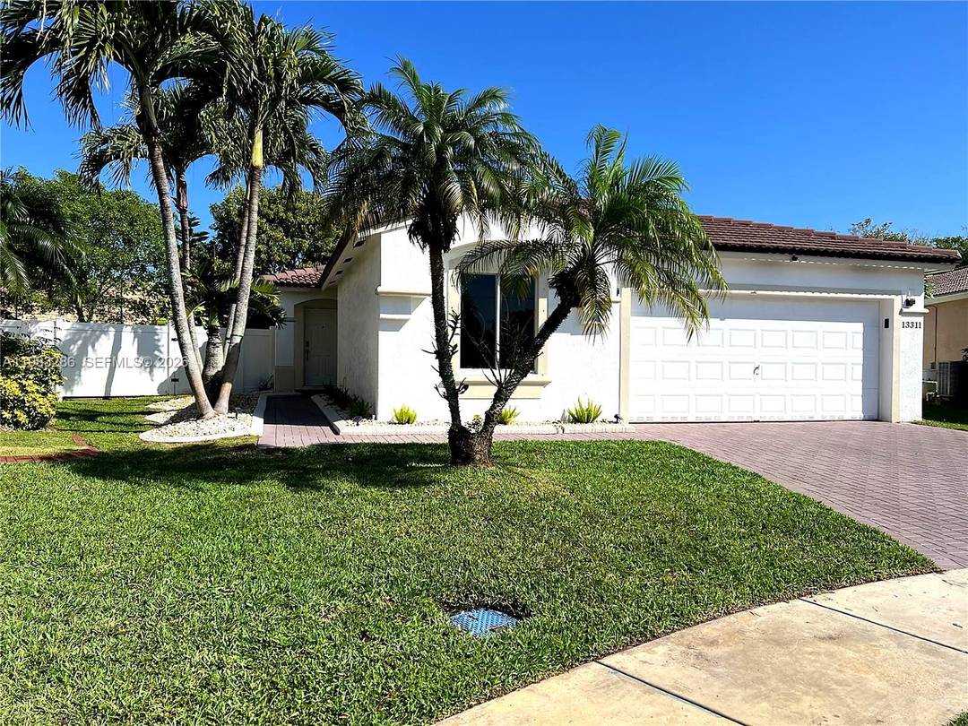 LOCATION, LIFESTYLE amp ; OPPORTUNITY Your Private Tropical Paradise in Miramar Welcome to your own hidden oasis in the heart of Miramar !