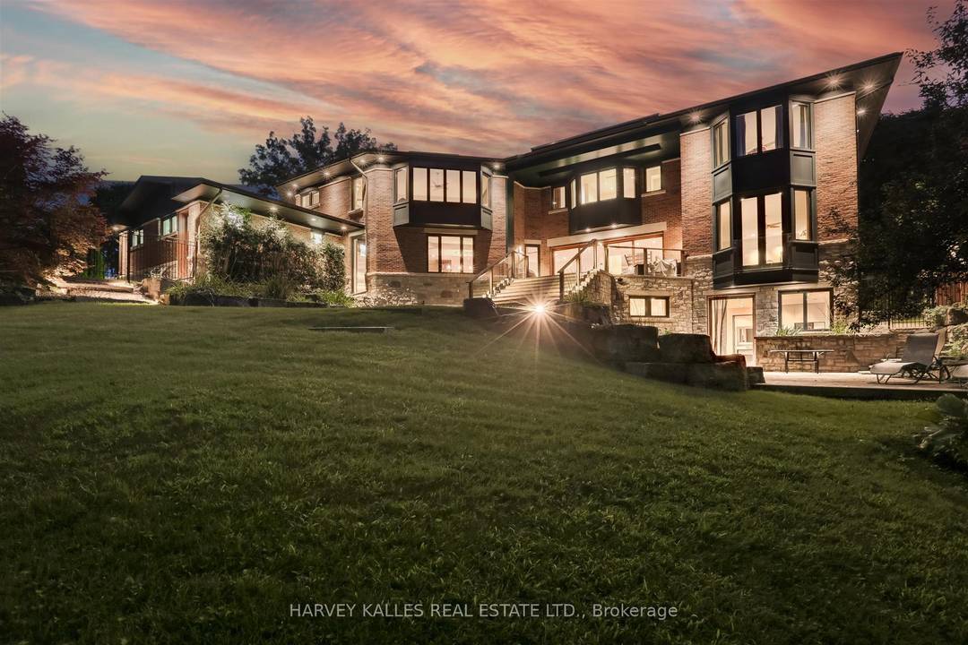 Discover a gem, custom built as a multi generational home, offering over 11, 000 sq ft of luxurious living space on a rare 125ft double lot at the edge of ...