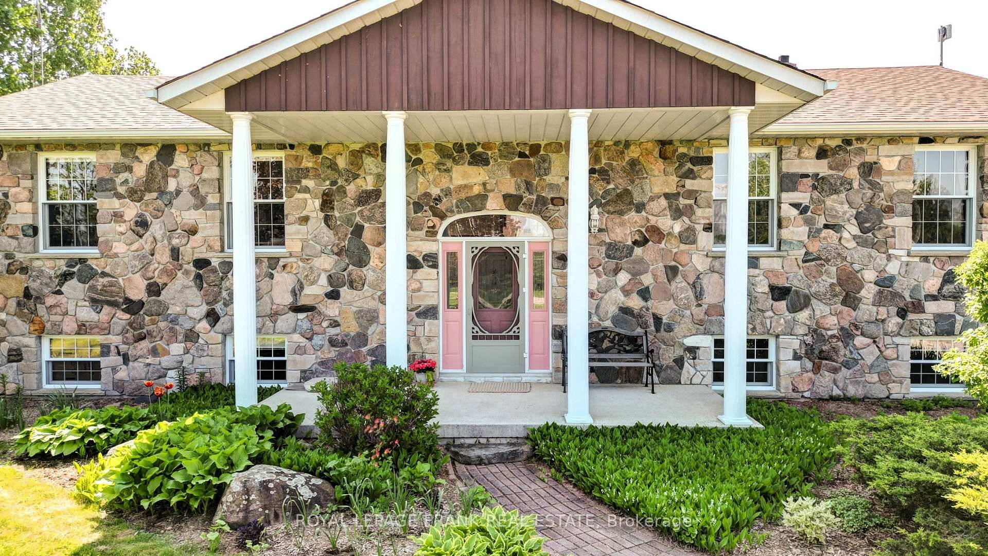 TRENT HILLS Gorgeous, Granite stone raised bungalow, set in privacy on a spectacular 50 acre parcel.