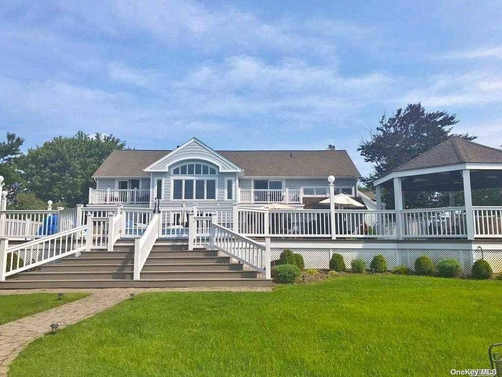 Located at the end of a quiet cul de sac, tucked away on a large property close to Main Street.