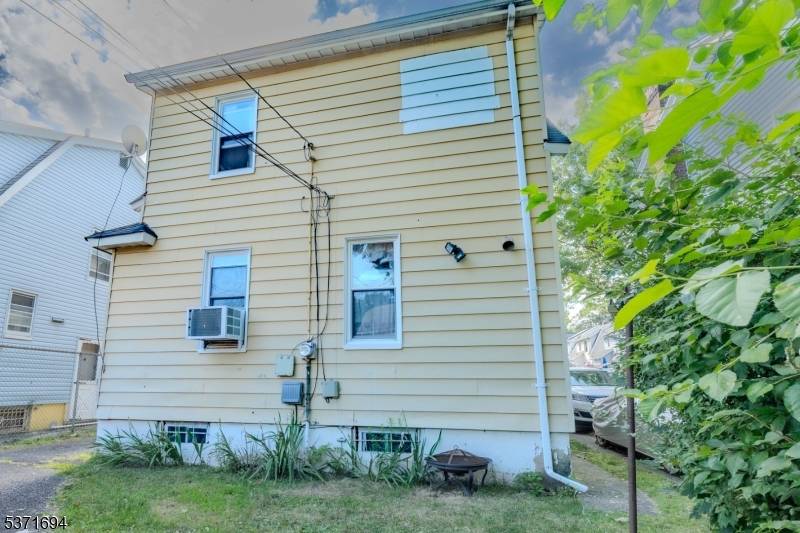 Welcome to 34 Warwick Street, a charming Colonial style home located in the heart of East Orange.