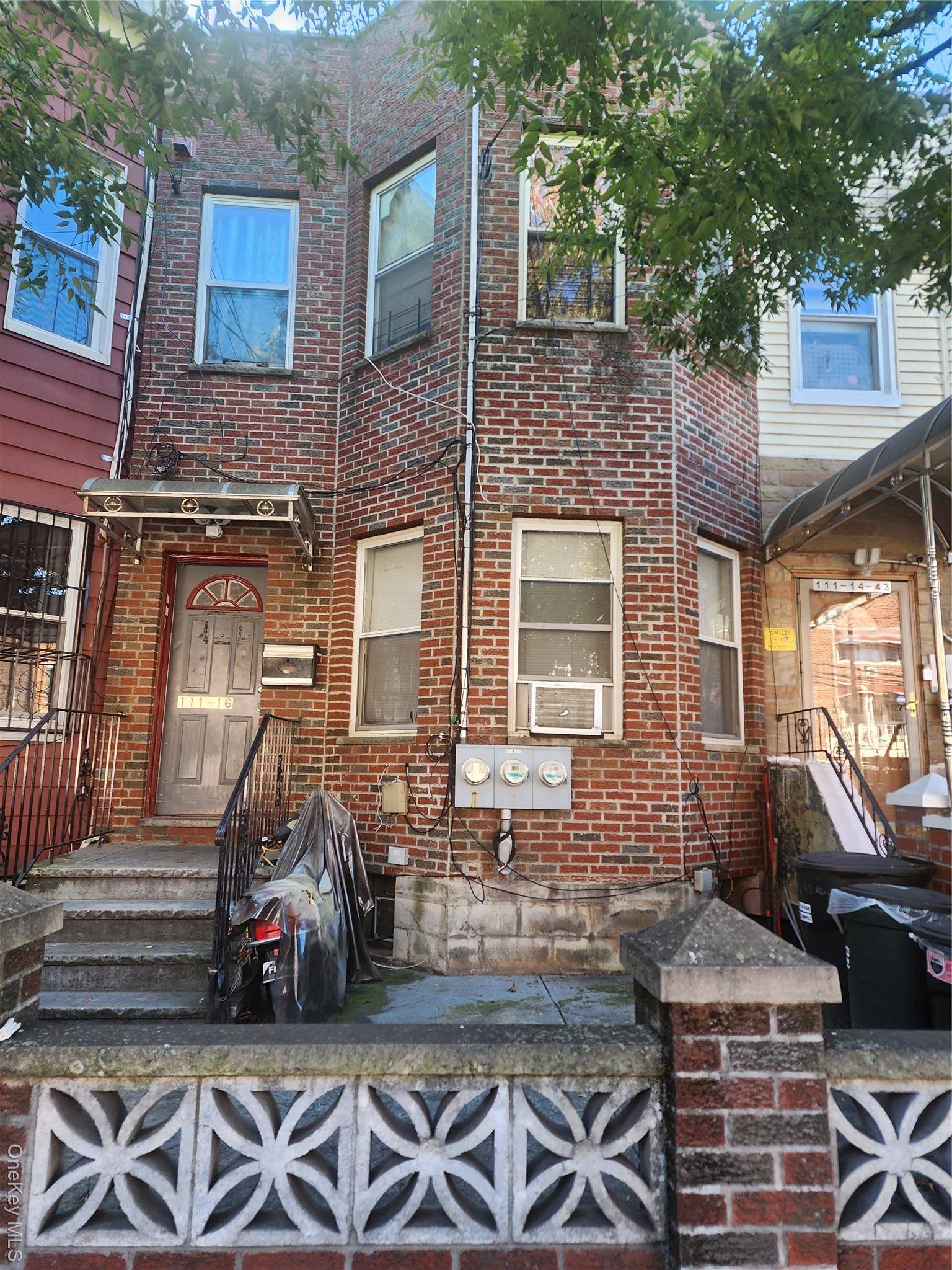 Two Family House Brick, 1st Floor 2 Bedrooms, Living Room, Kitchen, Full Bathroom.