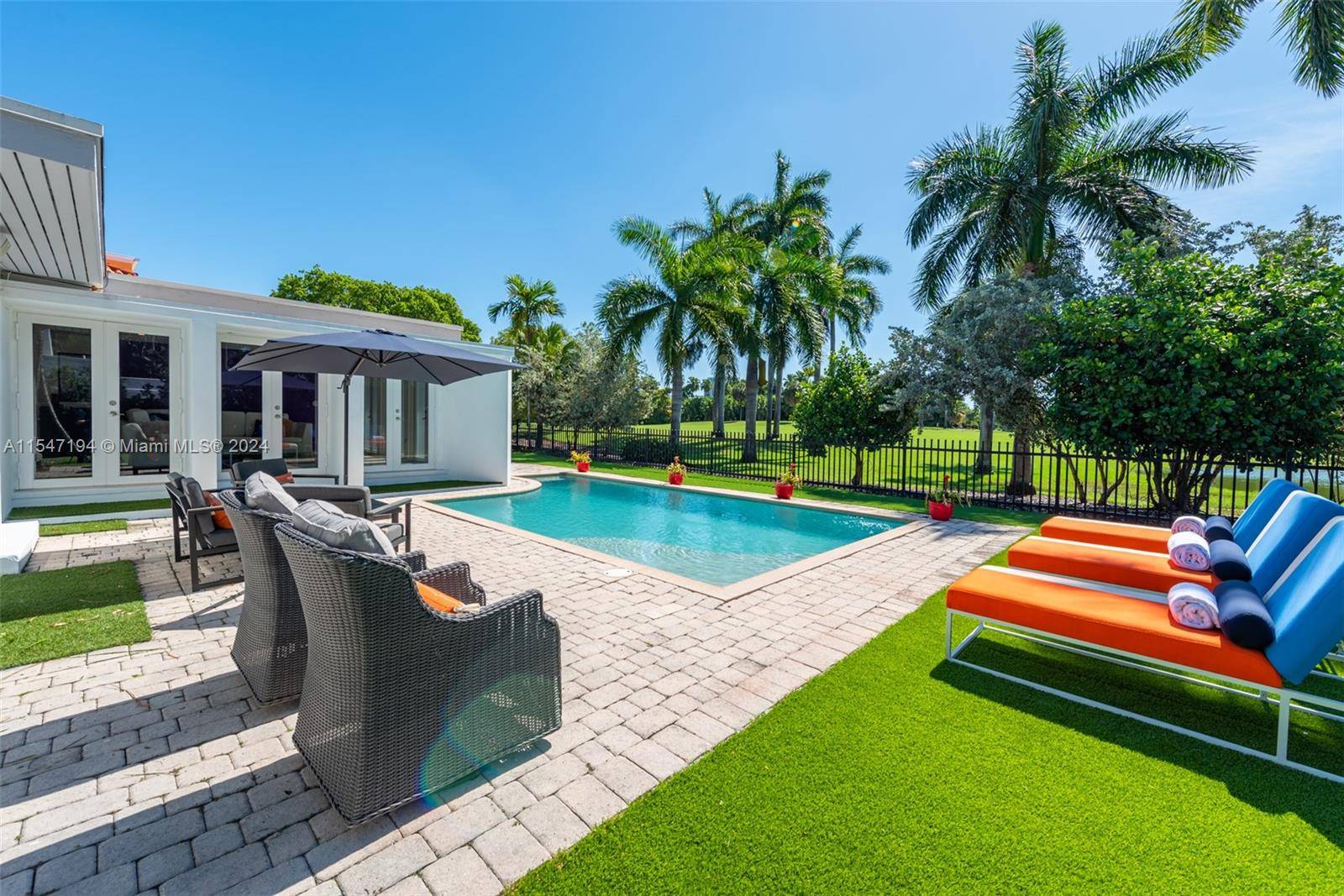 This stunning 3 bed 3 bath fully furnished Miami Beach pool home offers breathtaking views of La Gorce golf course.