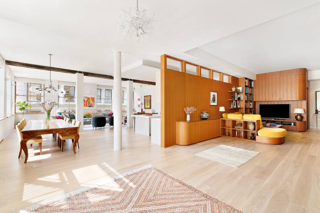 This glamorous and sprawling corner loft is flooded with light through its east and south facing walls of oversized, brand new double hung oak framed sash windows 14 in all, ...