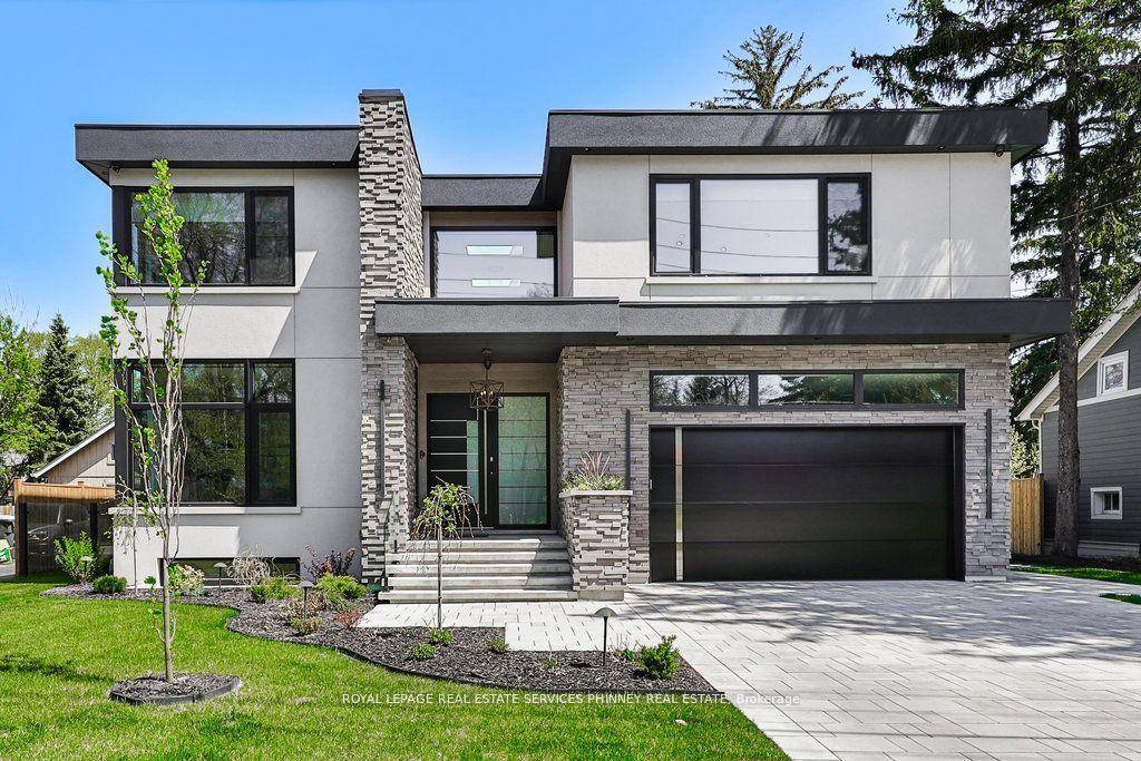 This custom home, in desirable Mineola, offers a combination of luxury, functionality, and style.