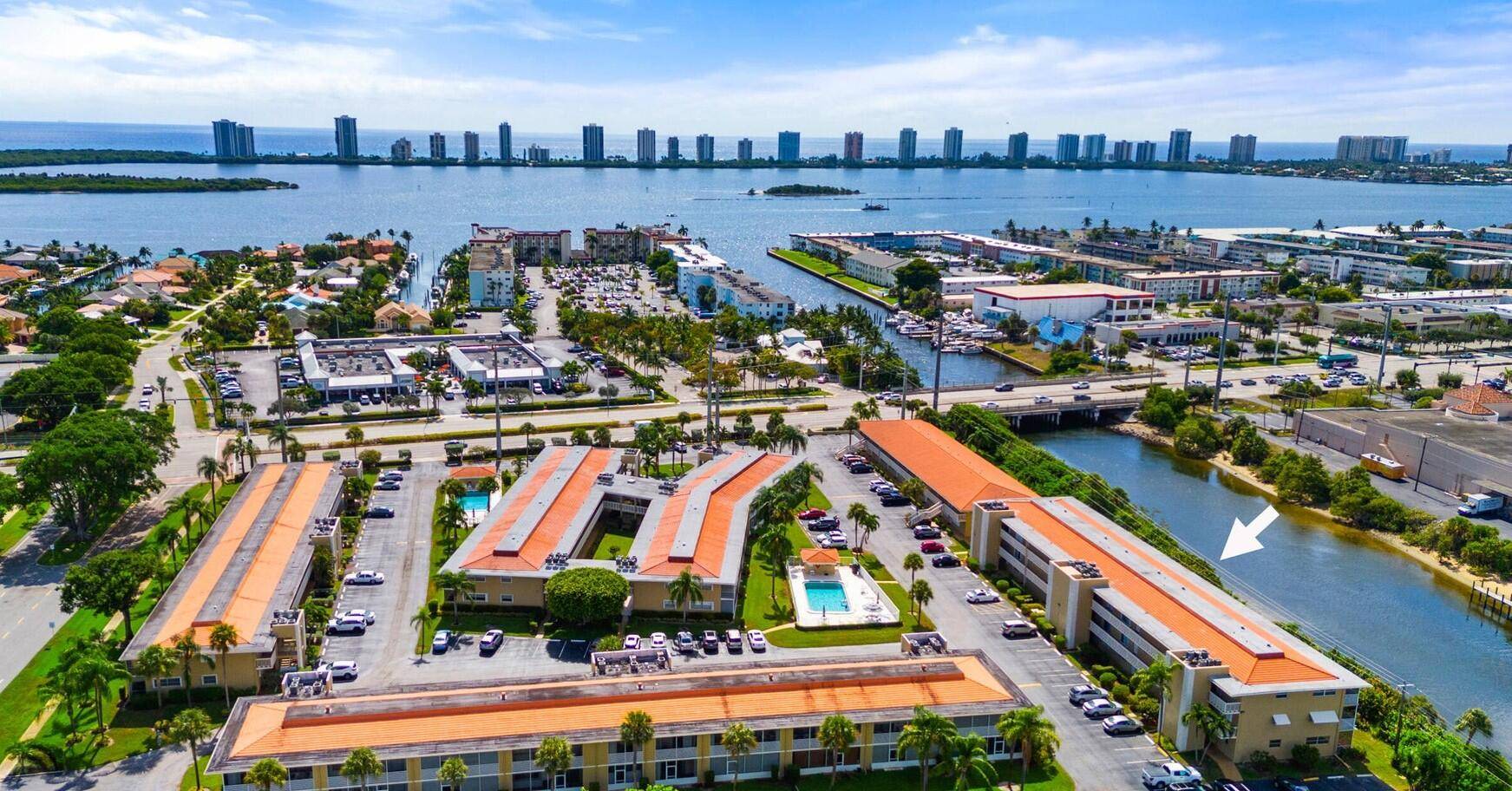 LOCATION, LOCATION ! Updated intracoastal waterway 2 bedroom, 2 bathroom condo in the heart of North Palm Beach, Brand new porcelain flooring throughout.
