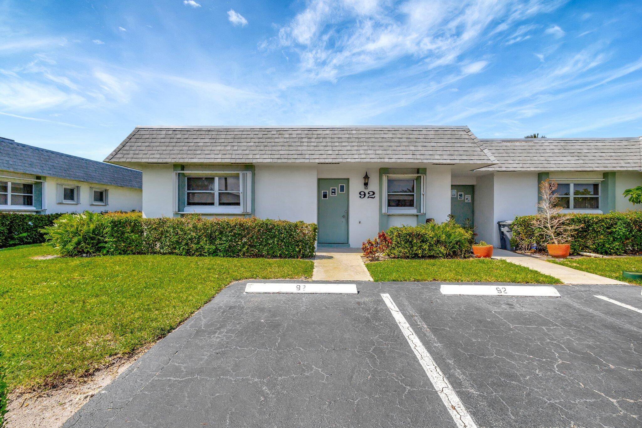 Nicely kept Fully Furnished 2 bedroom 2 bath corner unit villa with indoor laundry and 2 parking spaces outside the door.