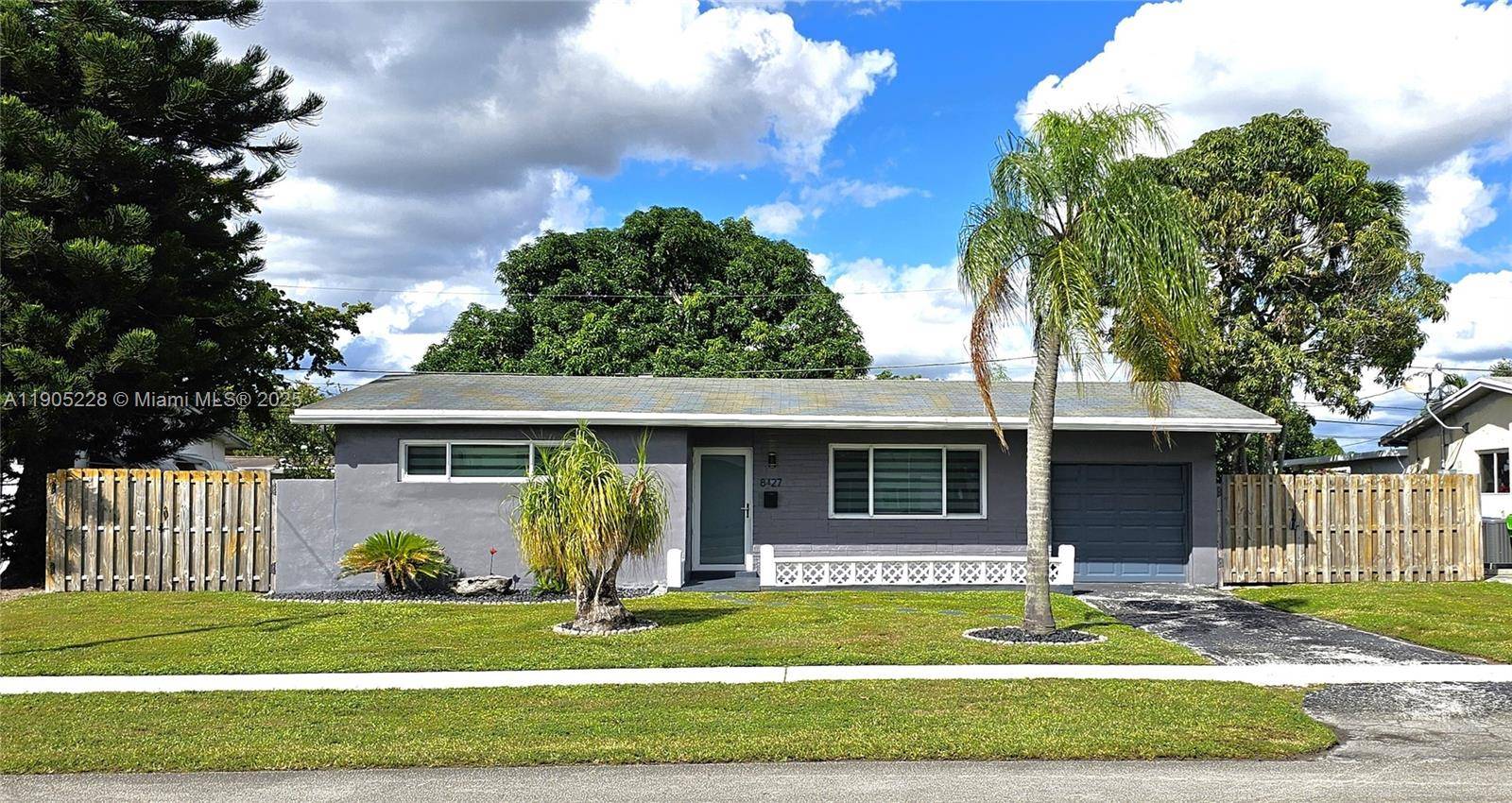 Beautiful and freshly exterior painted One Story house with 2 bedrooms, 1 bathroom, and a 1 car garage.