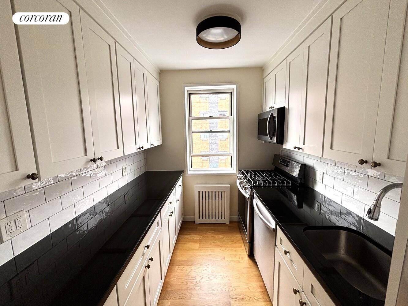 Condo in the Heart of Chelsea Fabulous One Bedroom, One Bath with Direct Access to Parking Garage !
