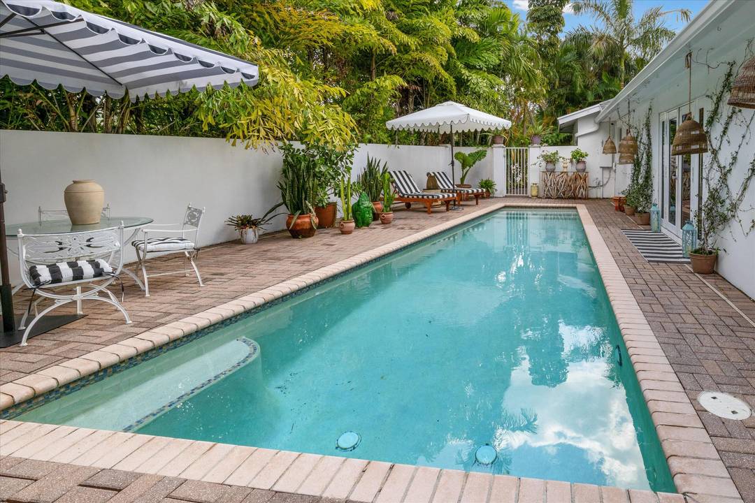 Available May 1, 2026. Stylish Mid Century Modern POOL Home in Highly Desired Northwood.