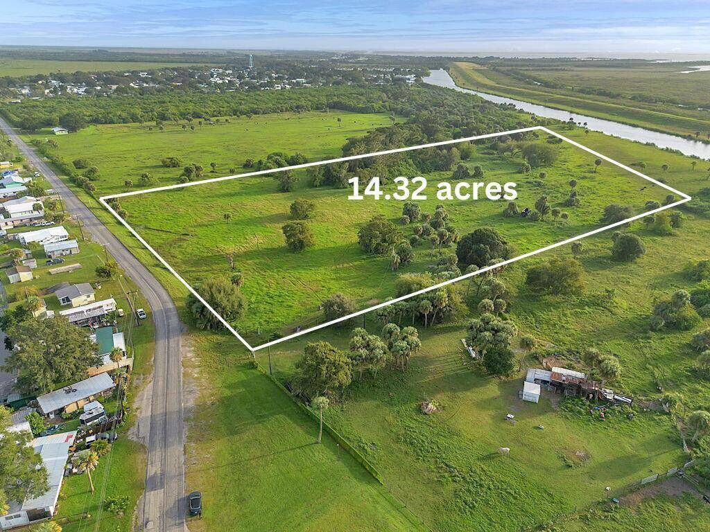 Undeveloped 14. 34 acre parcel with access to Lake Okeechobee.