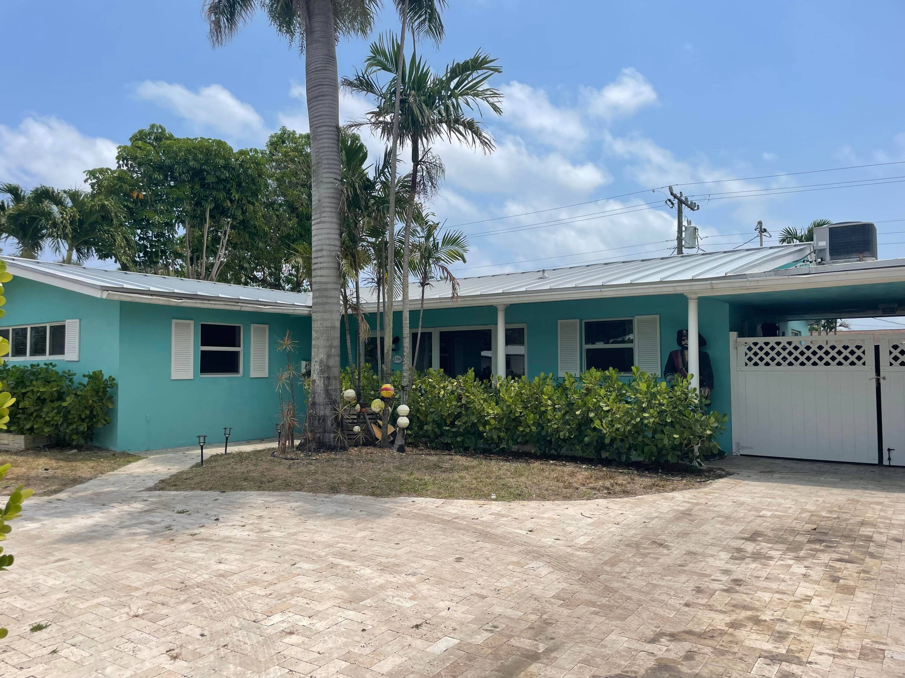 Discover coastal living at its finest with this charming home in the heart of Lighthouse Point, just moments away from the Atlantic Ocean !