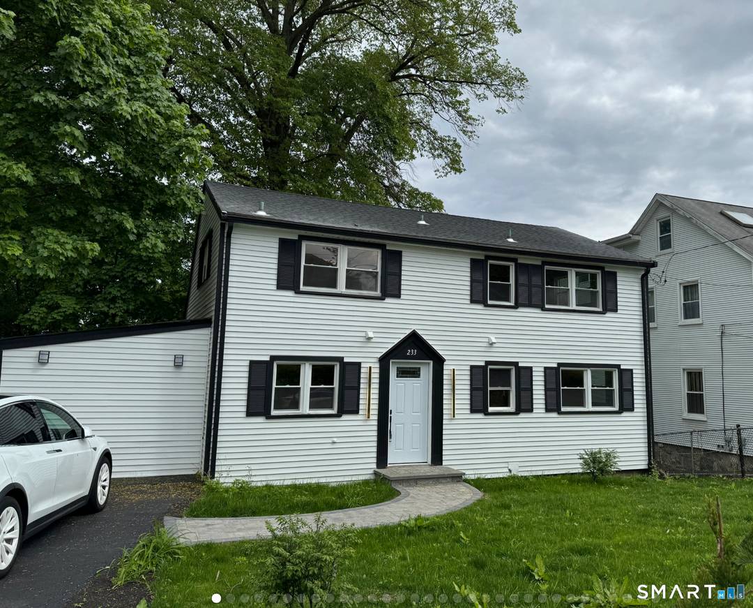 This beautifully reimagined 4 bedroom, 3 bath home in Stamford's sought after Glenbrook neighborhood blends timeless charm with modern living.