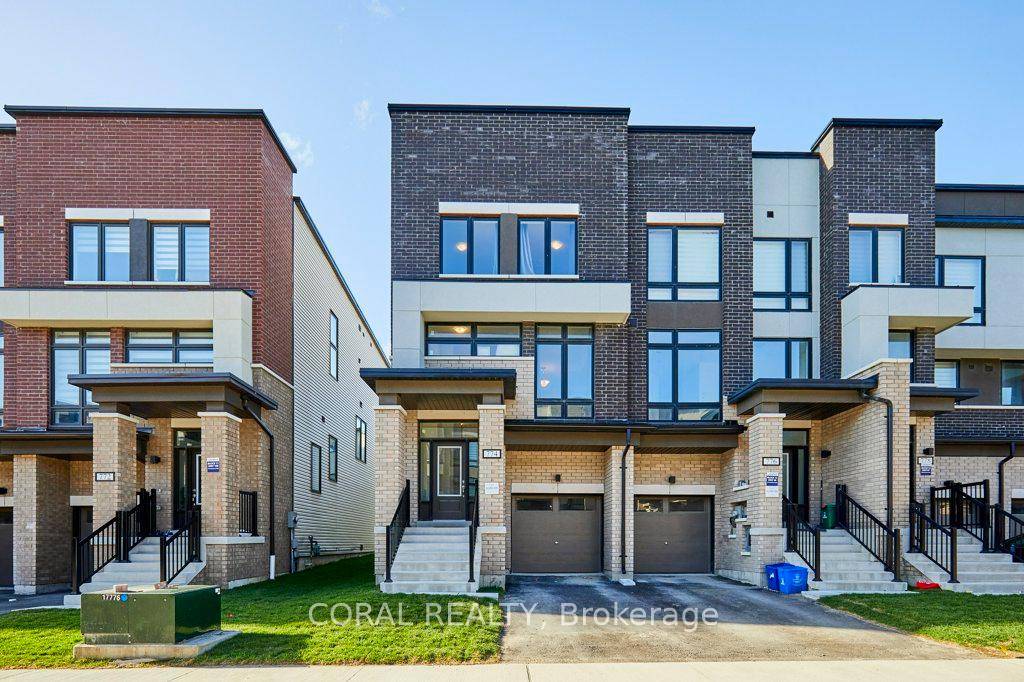 Spacious end unit townhouse with a smart, functional layout and in law suite potential !