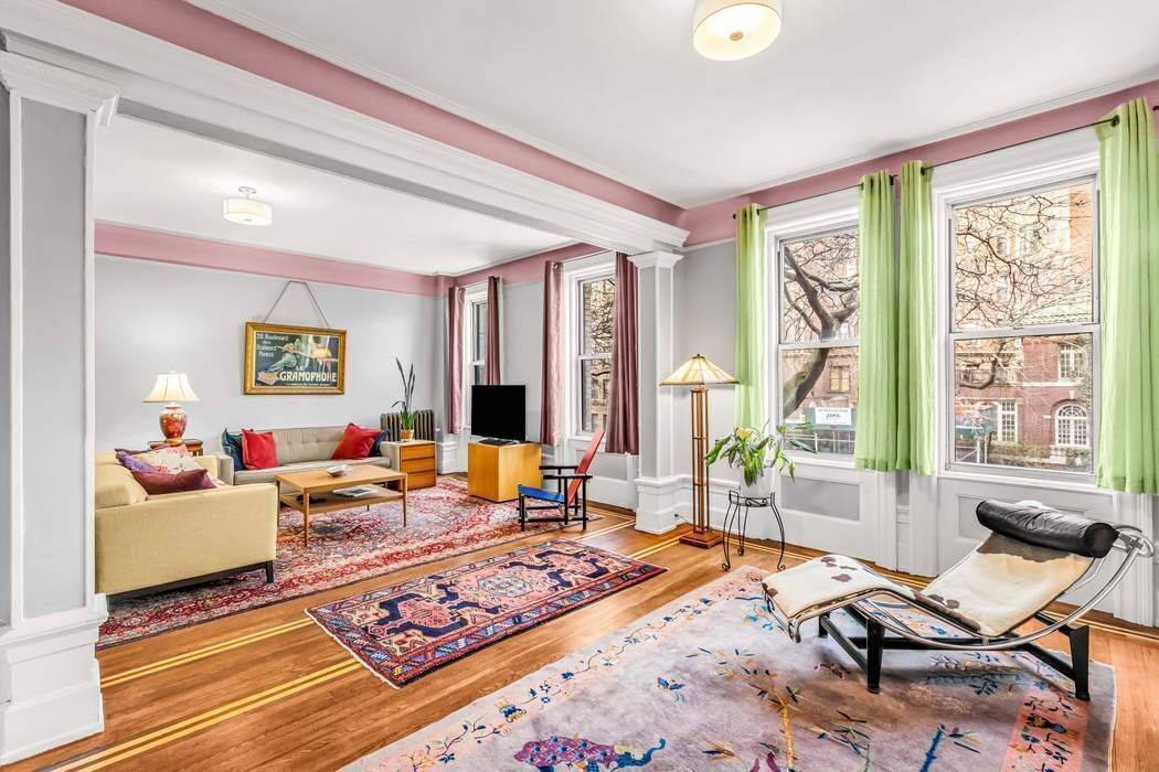 New price ! Elegant three bedroom two bath duplex home in The Grinnell, The Dakota of the North at 800 Riverside Drive.