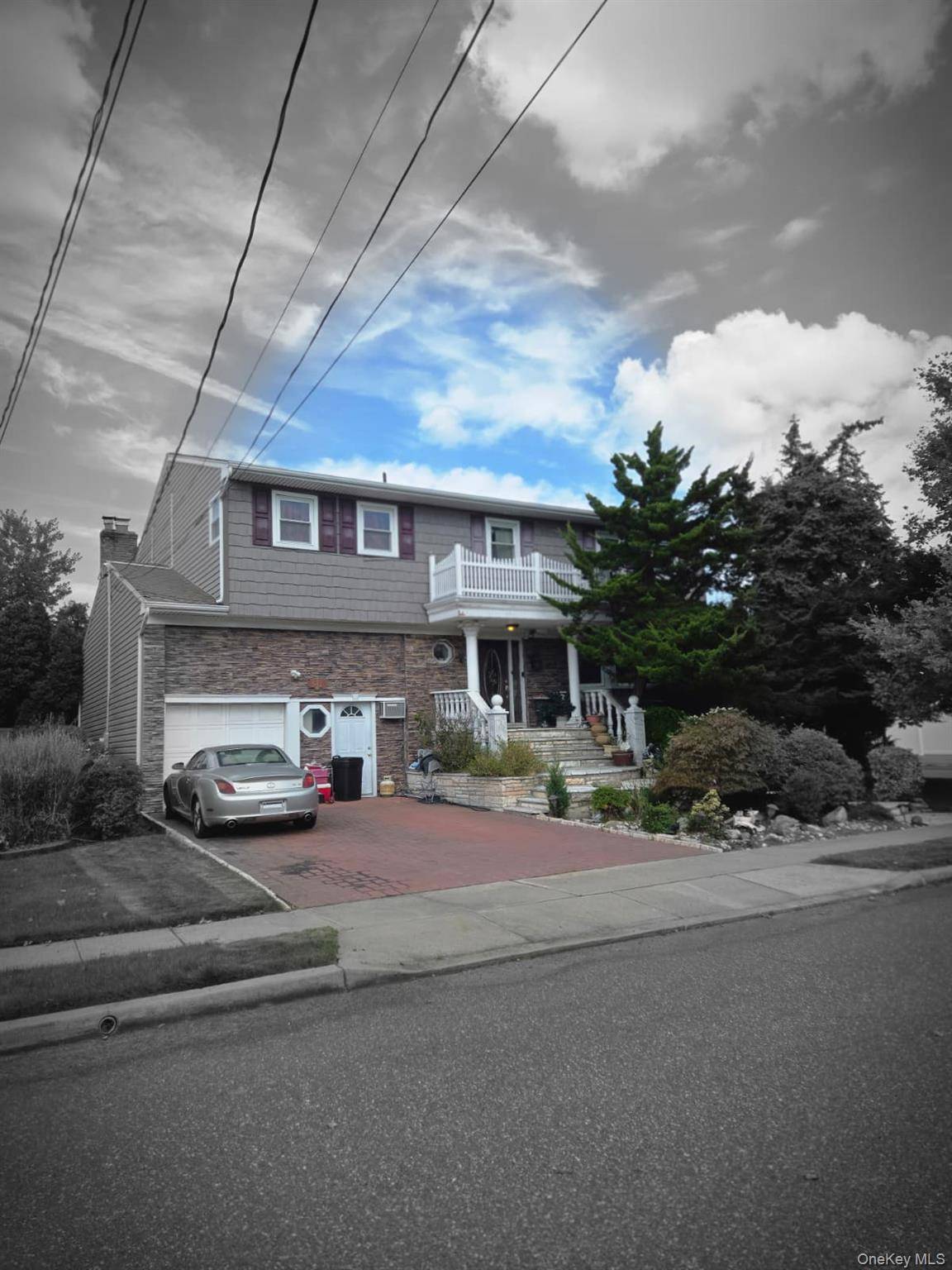 Grand SH Colonial with many unusual features including wood wainscoting, carved beams, wood floors all extra large rooms.