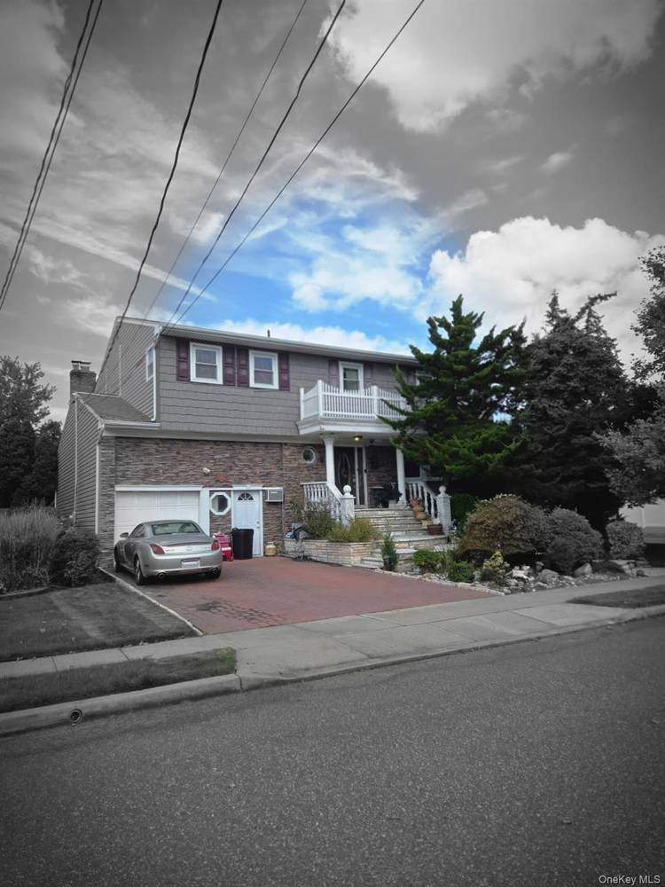 Grand SH Colonial with many unusual features including wood wainscoting, carved beams, wood floors all extra large rooms.