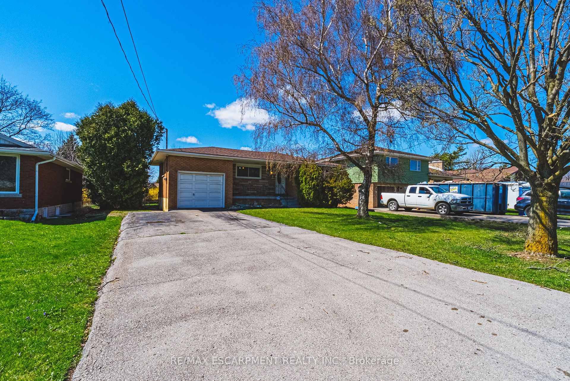 This all brick bungalow offers incredible potential in a sought after location.
