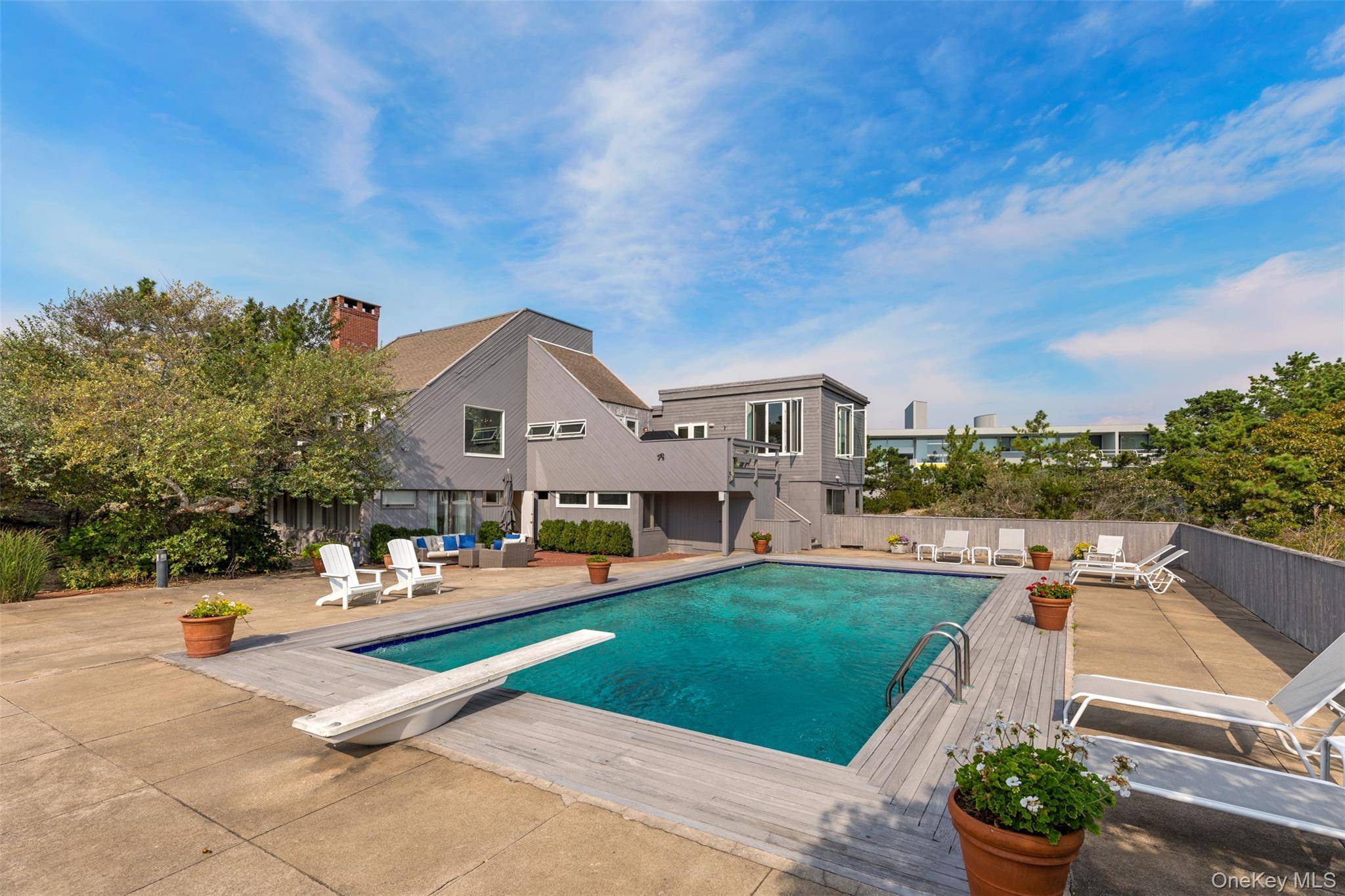 Set on 0. 69 acres, bordering a two acre dune preserve, this large 3, 100 sq.