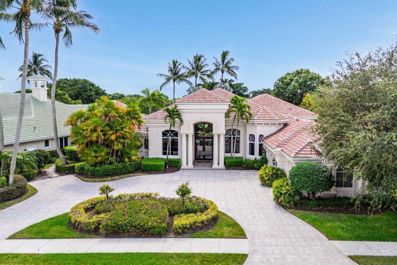 Welcome to 107 Saint Edward Place, a rare opportunity in the prestigious Estates of Saint Edward in Award Winning BallenIsles !