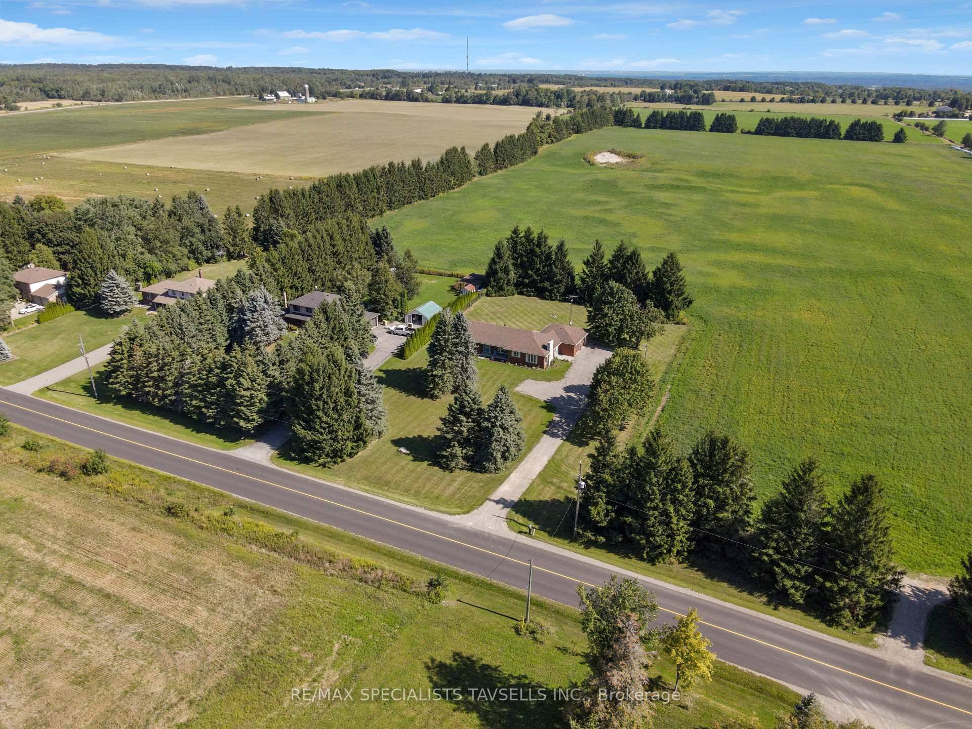 This property is situated on a spacious 1.