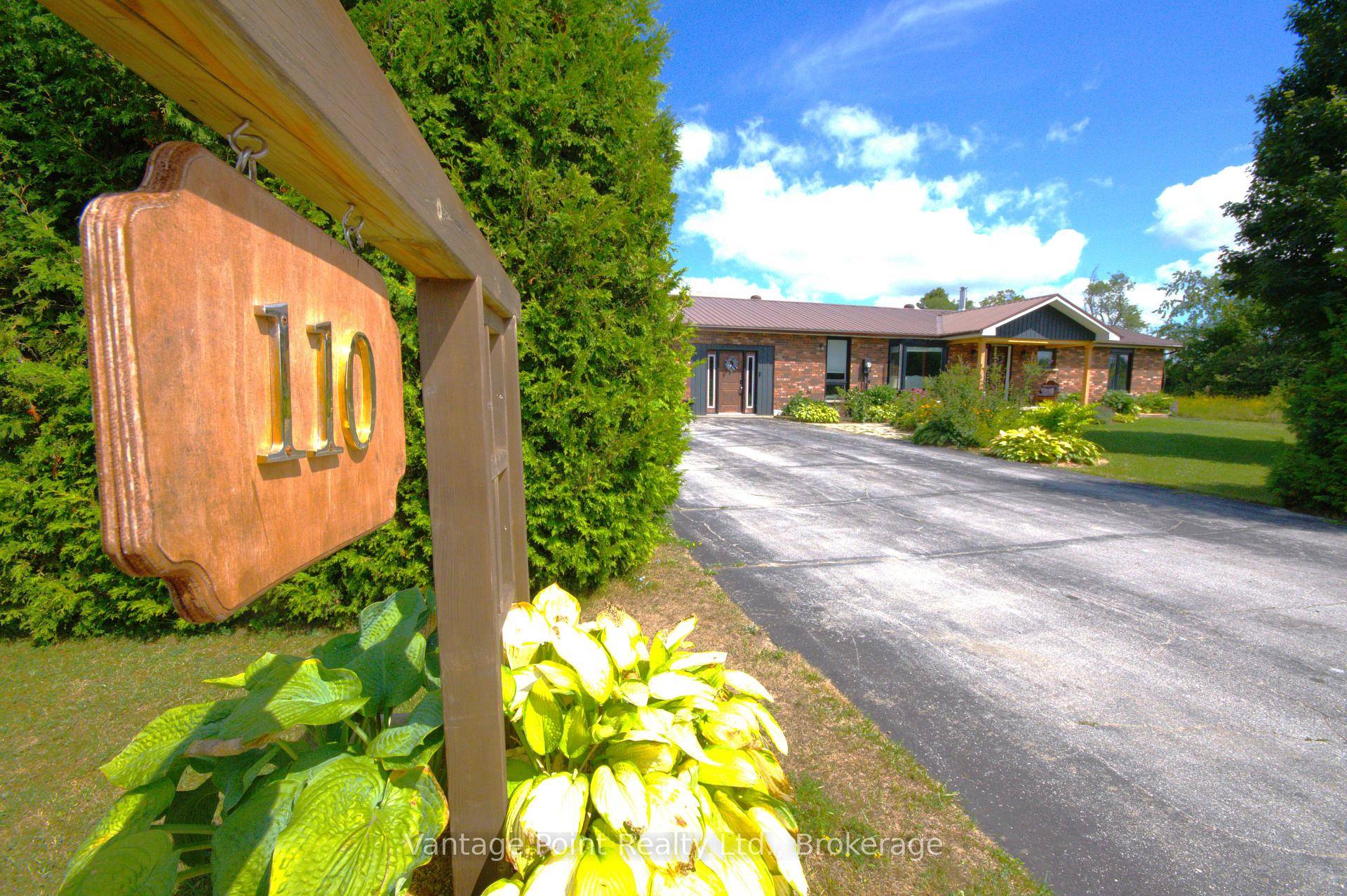 Welcome to this beautifully renovated bungalow in the village of Feversham, set on a generous half acre lot with a spacious, well landscaped yard.