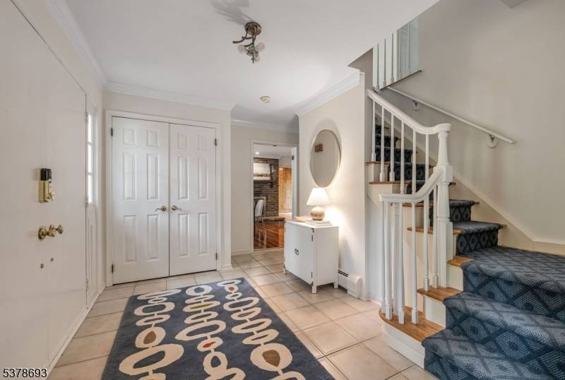 Welcome to this stunning center hall colonial located in the highly sought after Fardale section of Mahwah.