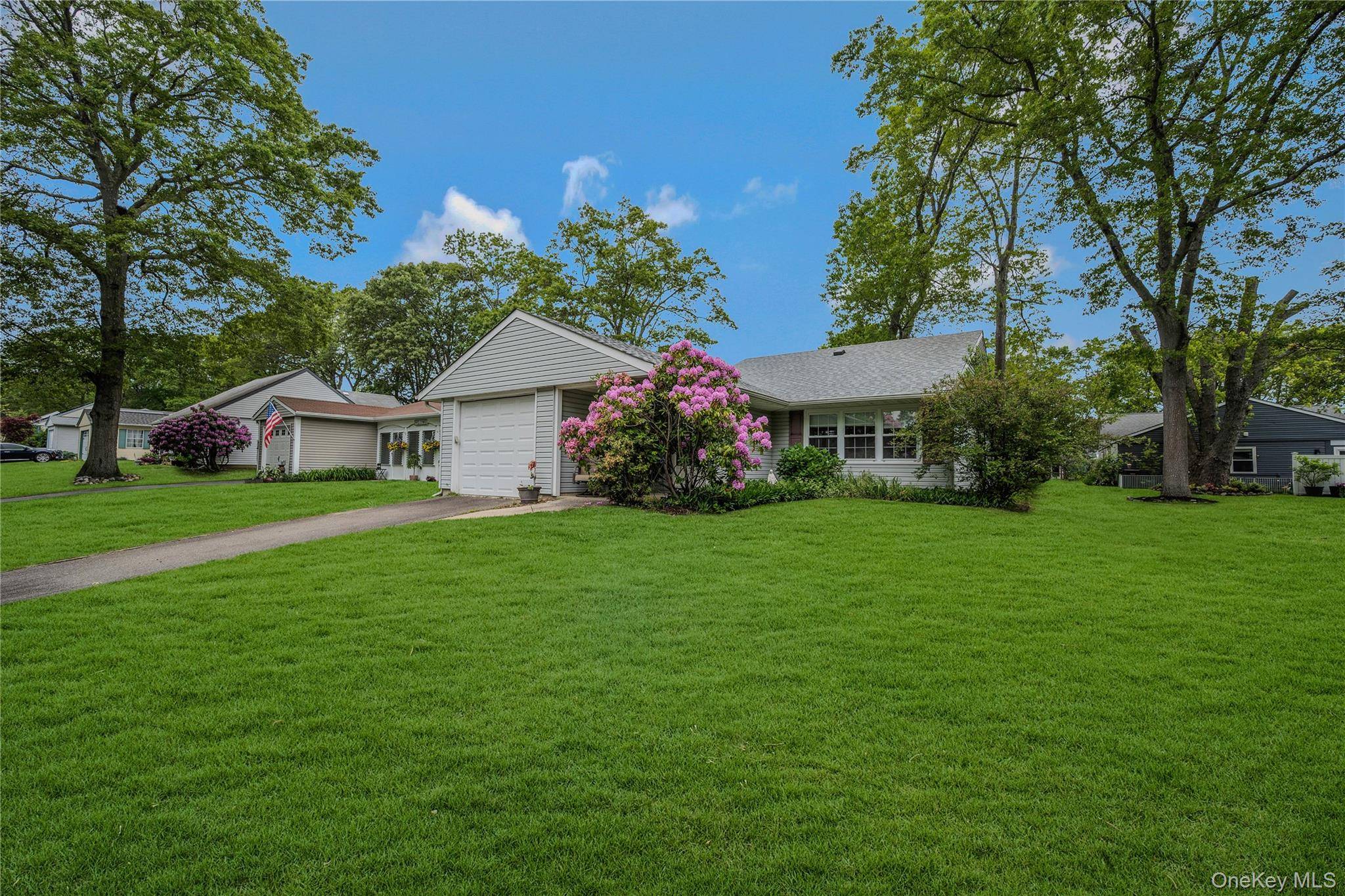 AVAILABLE and Reduced Price on this UPDATED East Hampton Model in the 55 OR BETTER community of Leisure Knoll !