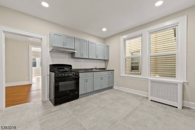 Charming two family home, with a freshly renovated first floor that is move in ready along with a brand new kitchen and bathroom.