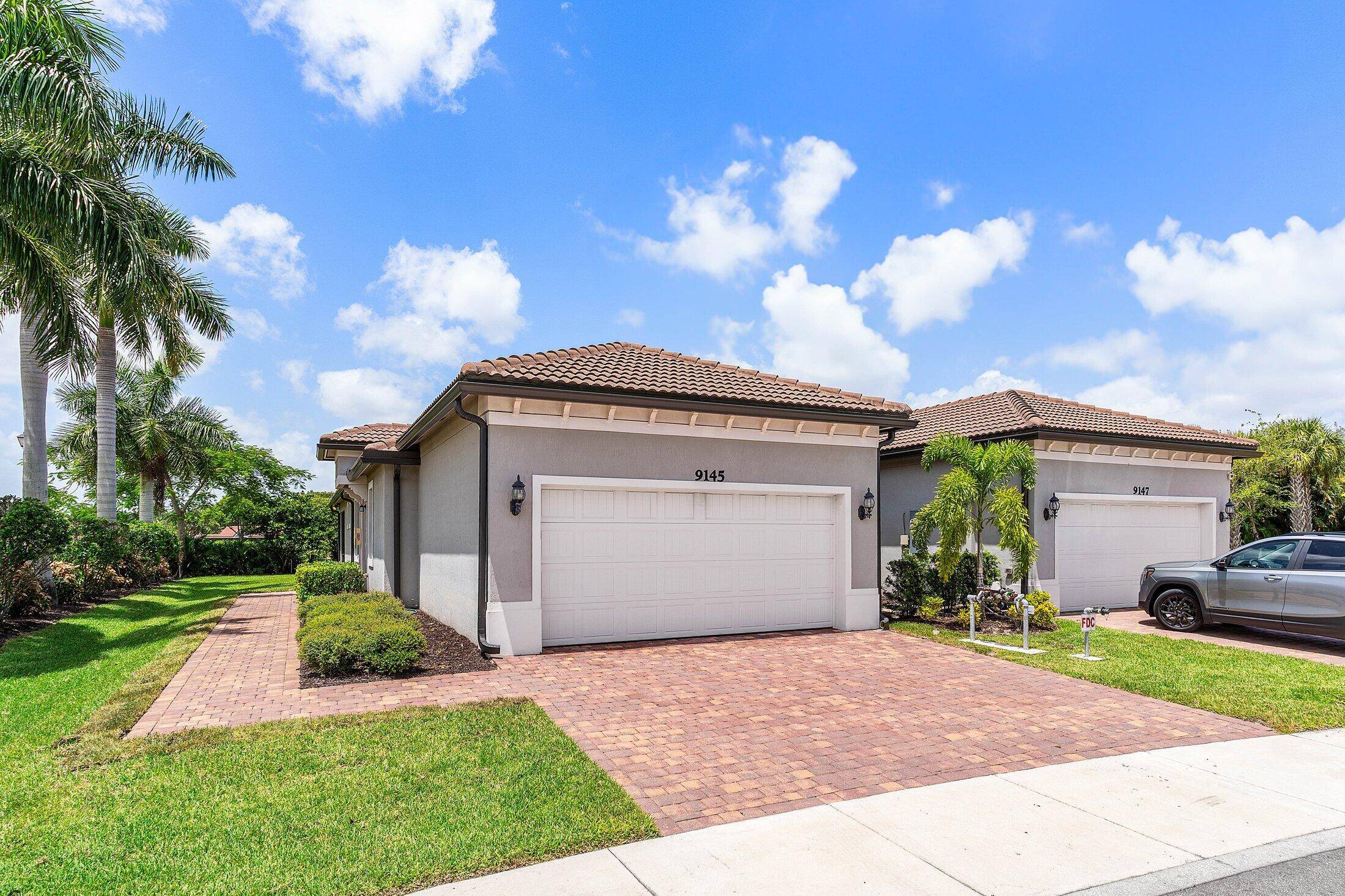 Gorgeous two bedroom plus den, two bathroom villa in the new Boca Flores community.